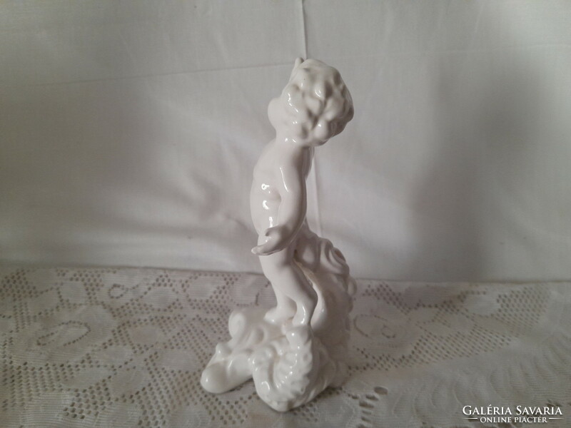 Unmarked ceramic or porcelain putto statue
