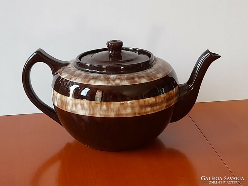 Antique glazed ceramic teapot
