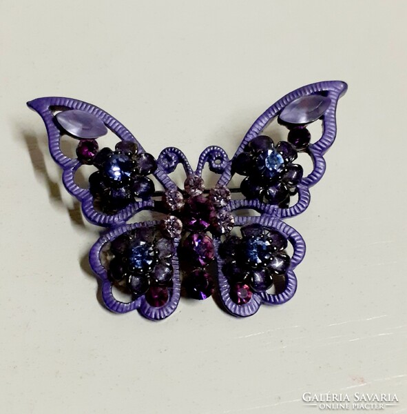 Butterfly brooch in nice condition, studded with many tiny pink glass stones