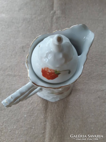 An extremely rare shaped ceramic spout with a wonderful pattern.