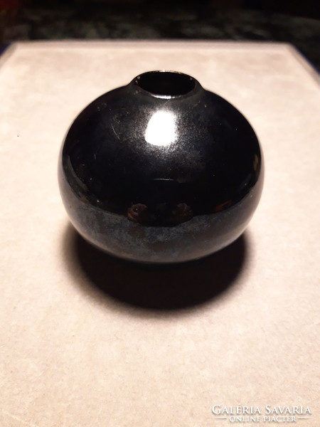 Spherical, small black old ceramic vase