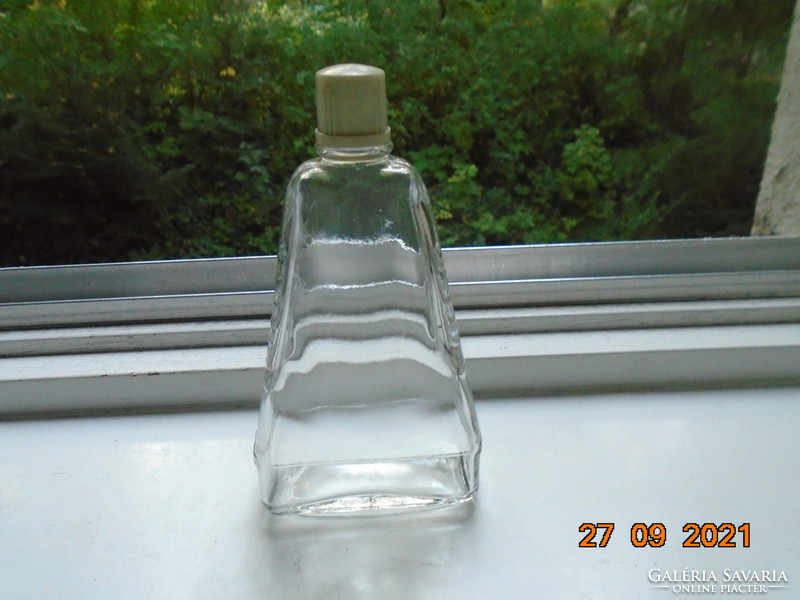 Flat thick-walled perfume bottle with a typical Soviet-Russian lavender relief pattern
