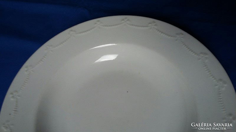 Large white porcelain bowl with round floral garland relief