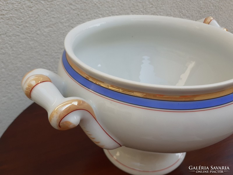 Old porcelain blue striped comma folk bowl with white soup