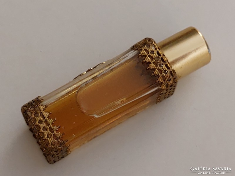 Old perfume bottle in vintage cologne bottle