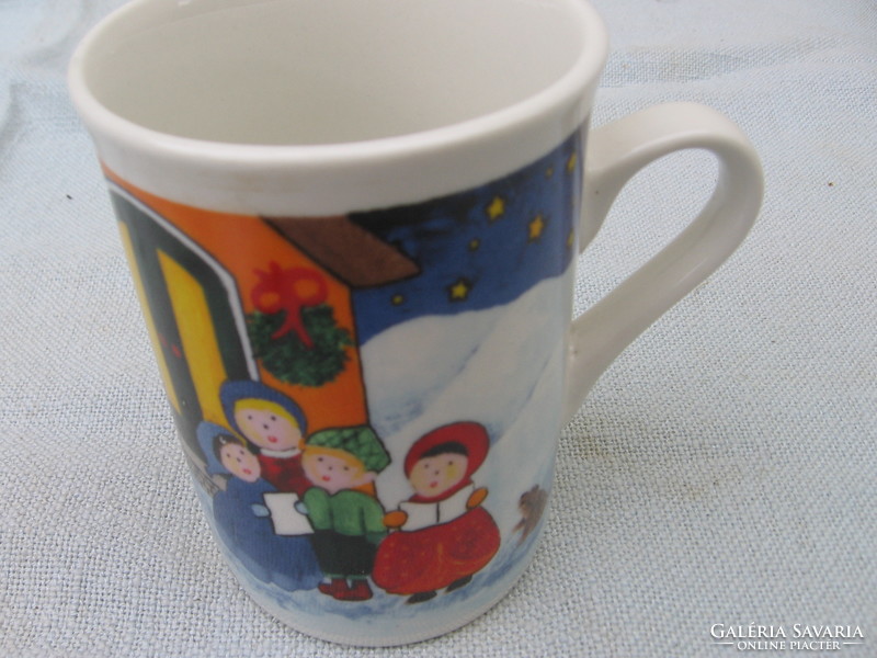 Artistic, collector's mug of children singing to Santa Claus