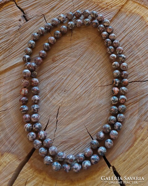 Long leopard jasper necklace with knotted lacing
