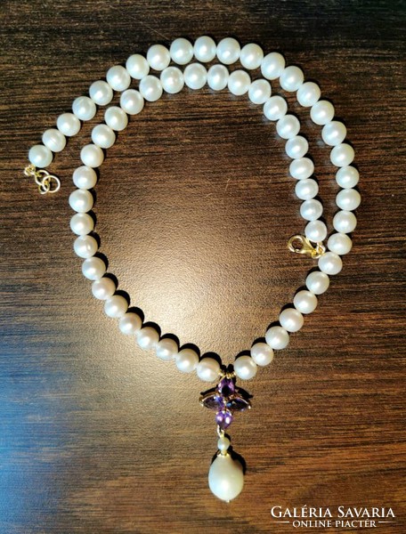 Genuine pearl necklace with string of amethyst inlays