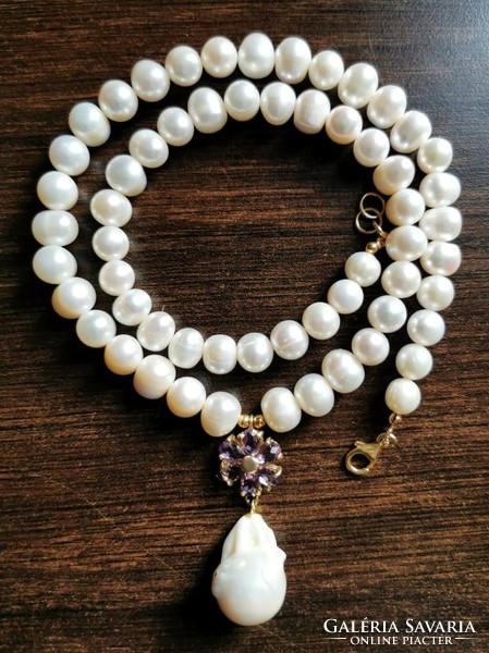 Genuine pearl necklace with string of amethyst flowers