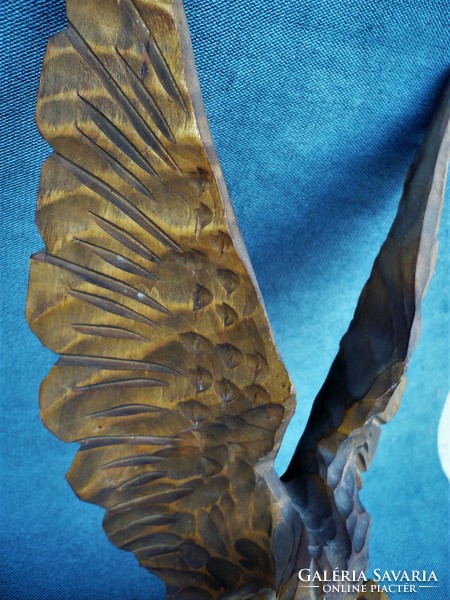 Carved wooden eagle statue
