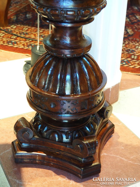 Richly carved pedestal
