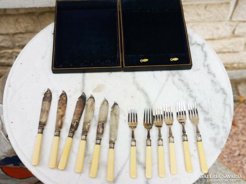 Antique master-marked cutlery set in a box. Dinner or fish silver type set chiseled