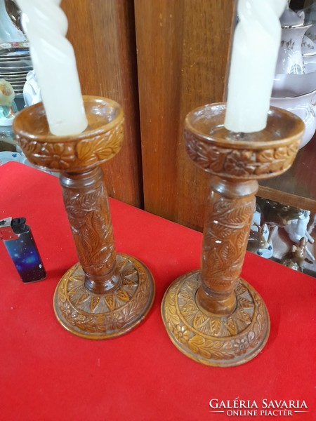 Pair of hand-carved wooden candle holders with folk motifs. 18.5 cm.