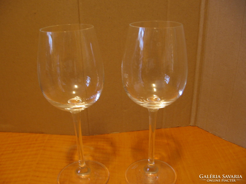 A pair of marked Rona crystal wine and champagne glasses for festive, casual and wedding toasts.