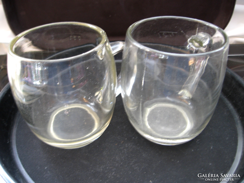Pair of retro ball shaped jars calibrated, polished