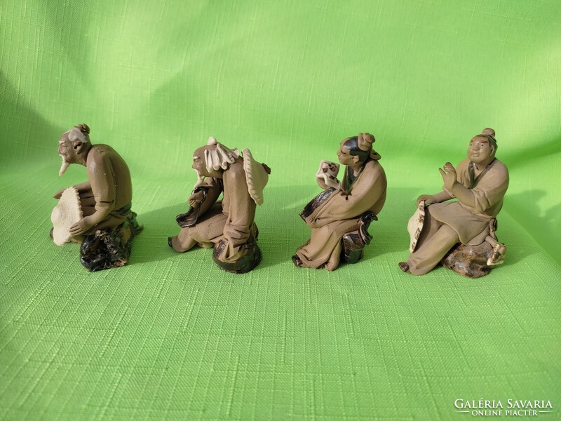 Four porcelain figurines from Xiamen