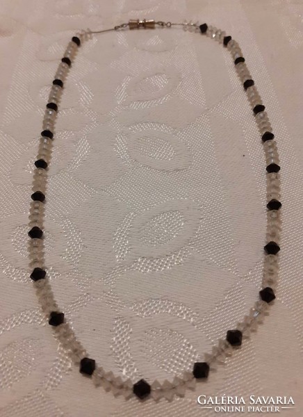 A charming necklace of black and white polished glass (or crystal) beads