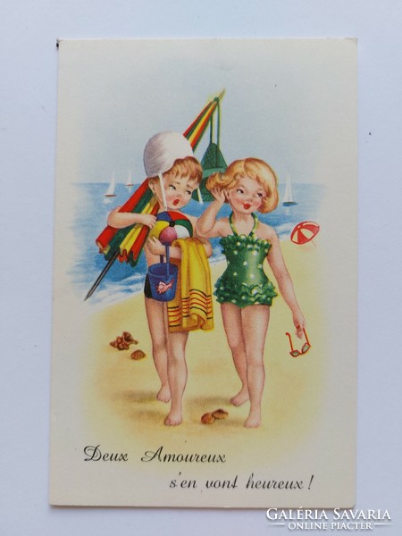 Old postcard with cartoon children on the beach
