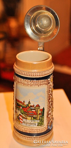 German beer mug with a lid with an old cityscape of Nuremberg - porcelain