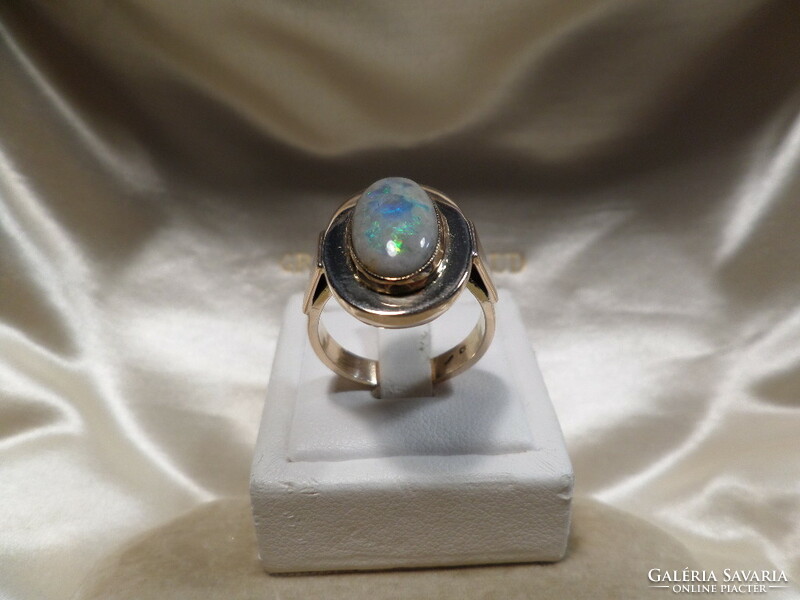 Gold ring with huge opal