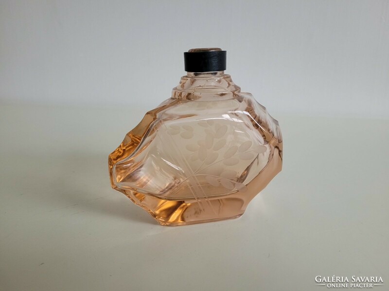 Old perfume bottle pink polished art deco cologne