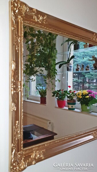 (H. ) Wonderful, antique, gold-colored, blonde frame, large mirror. 62X 131 cm.