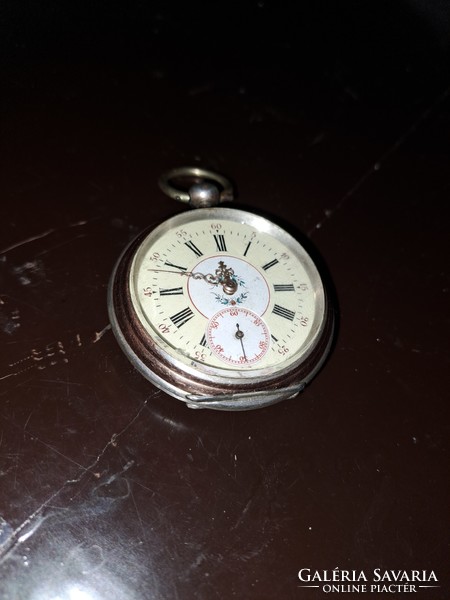 Antique silver key pocket watch from the 19th century