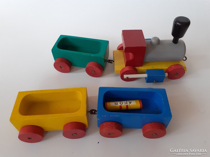 Retro wooden toy train with old wooden locomotive toy
