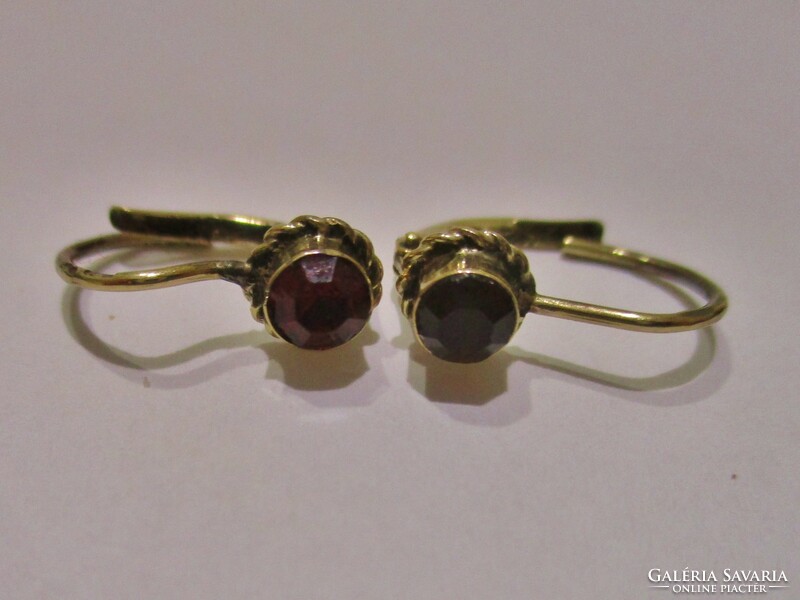 Beautiful antique girl's gold earrings with garnet stones