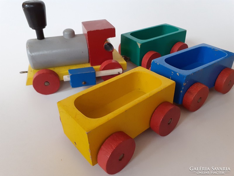 Retro wooden toy train with old wooden locomotive toy