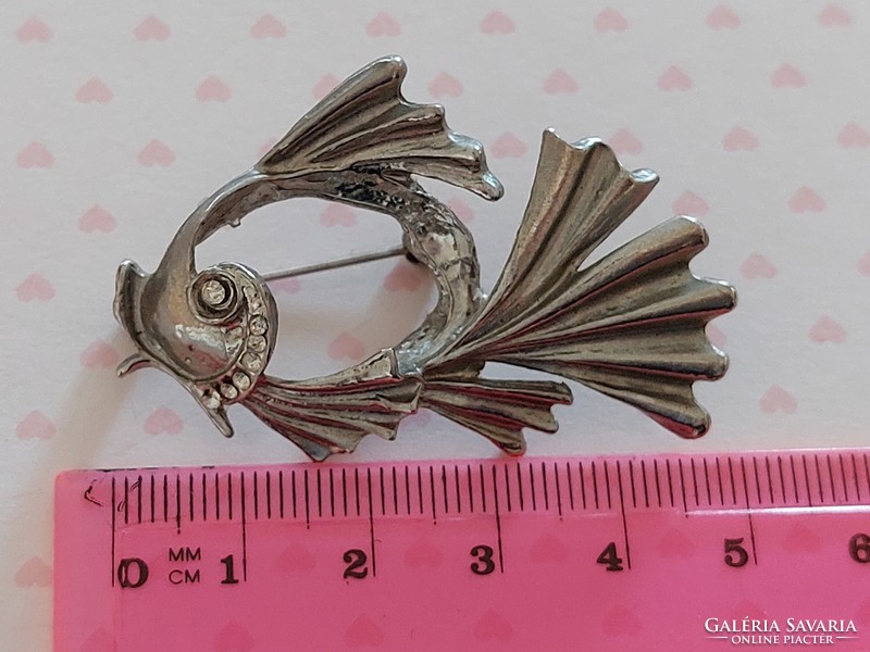 Old brooch fish shaped metal badge