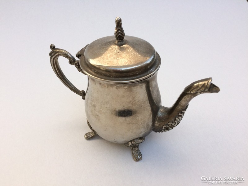 Baroque nature old metal coffee pot with vintage spout