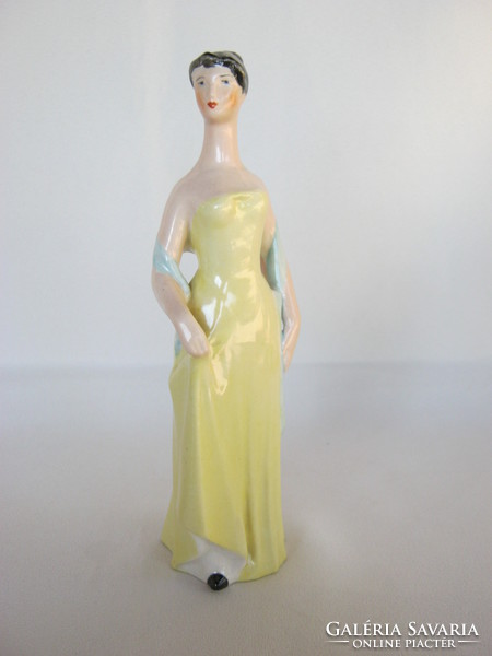 Drasche quarries porcelain girl in yellow dress