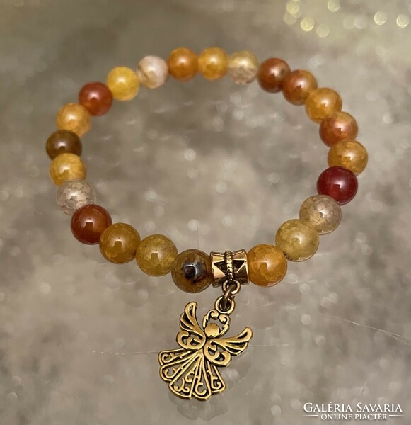 Amber-colored agate mineral bracelet, antique gold-colored angel whistle charm