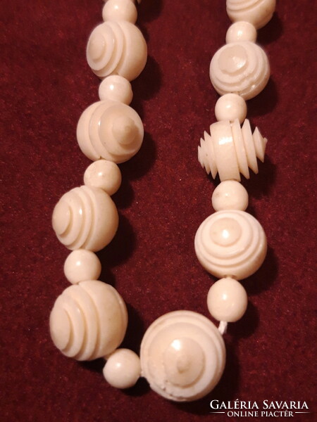 Carved bone necklace - 48 cm