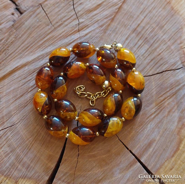 Beautiful imitation amber necklace with gold-plated spacers
