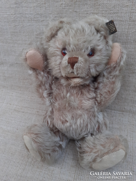 Antique mohair straw teddy bear with long paws on felt sole and paw glass eye with long nose