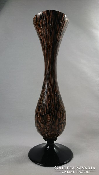 In the second half of Xx.Szd a glass vase decorated with a gold pattern on the outside was made on a black background