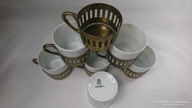 Fraureuth German porcelain glasses with pierced copper insert. In terms of their function, coffee cups