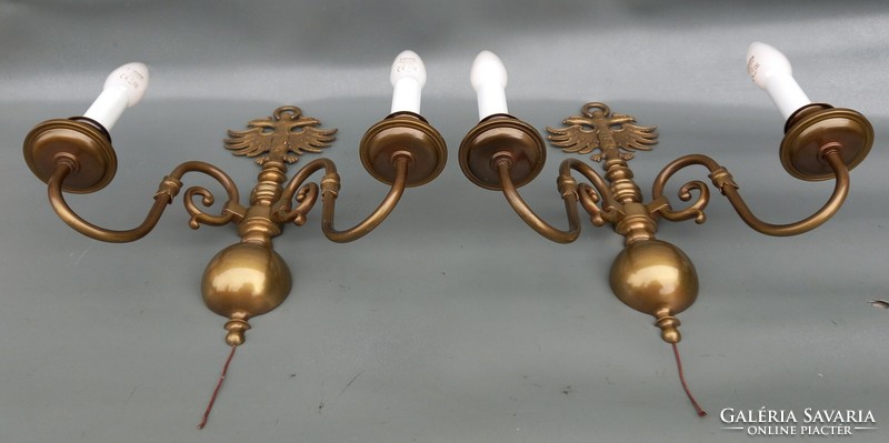 Large Flemish copper wall arm with a pair of eagles