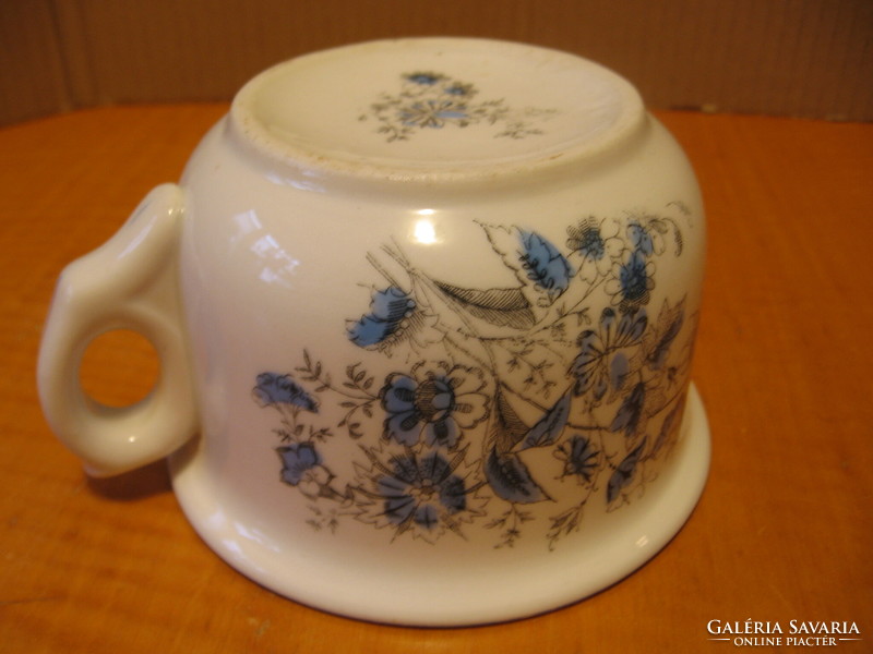 Antique bieder also has a blue flowered koma cup, koma mug, koma cup