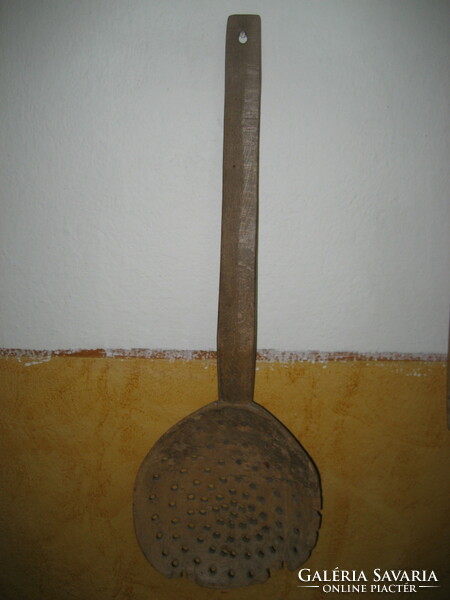 Antique folk straining scoop