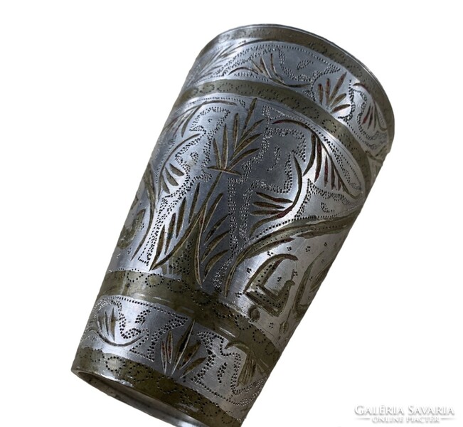 Old Indian handcrafted copper cup with meticulously decorated engraved pattern