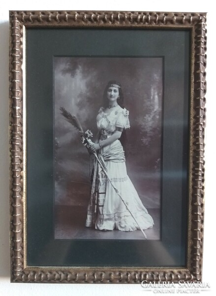 Vintage female photo, in a frame