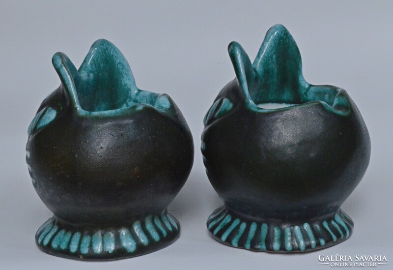 Cat head ceramic ashtrays.