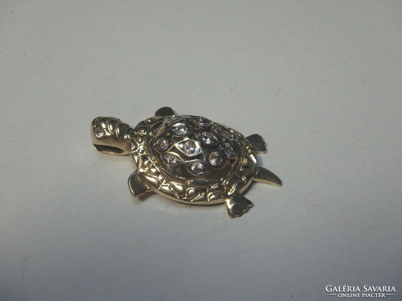 14K bicolor gold turtle pendant with zirconia.
