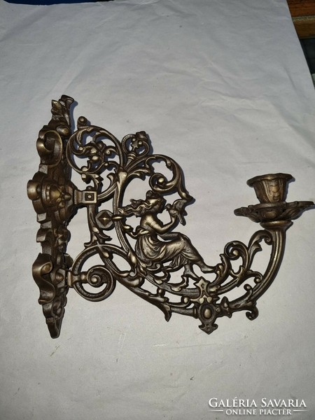 Old copper wall candlestick