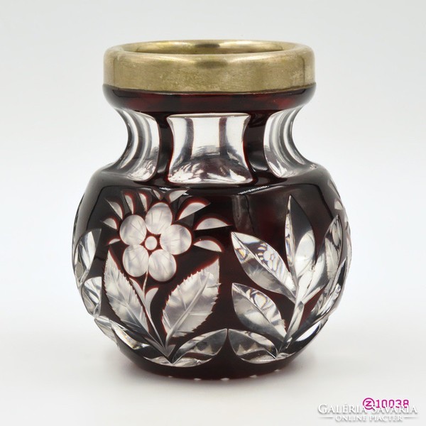 Old, small, peeled burgundy crystal vase, glass painted with copper-ruby stain, with silver rim.