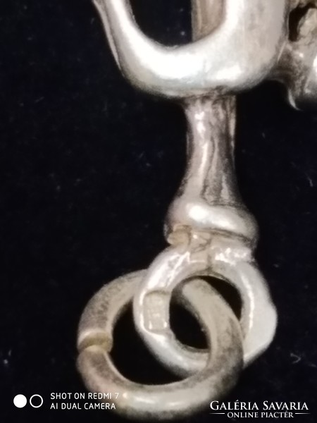 Silver (925) trumpet pendant.