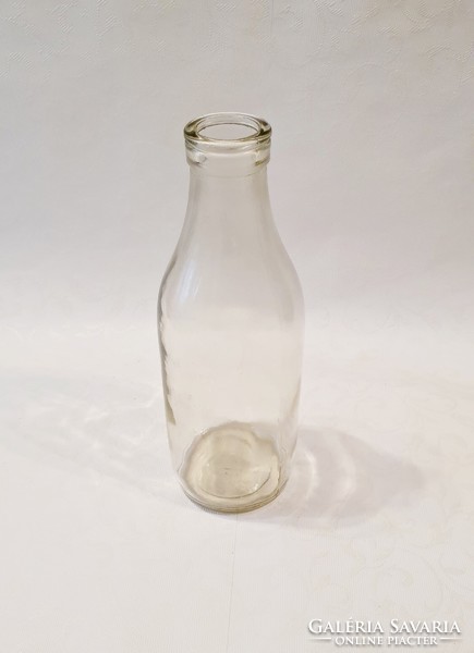 Old retro milk bottle. 26.5 cm high.